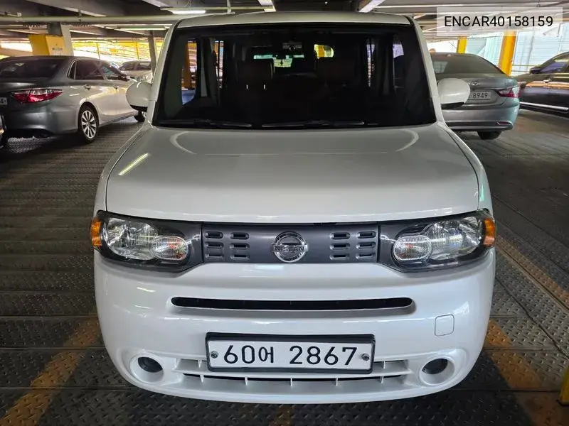 Nissan Cube 2013 года выпуска